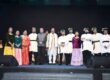 नोएडा स्टेडियम में ‘रेजोनेंस ऑफ उत्तराखंड’ कार्यक्रम के दौरान सांस्कृतिक प्रस्तुतियों का आनंद लेते हुए